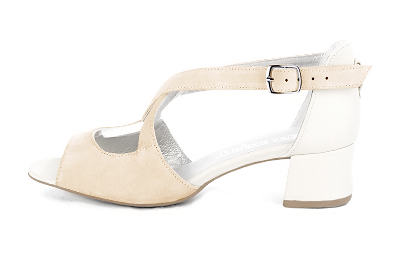 Champagne beige and off white women's closed back sandals, with crossed straps. Round toe. Low flare heels. Profile view - Florence KOOIJMAN